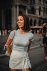 a woman smiling outside