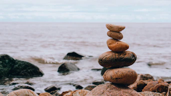 a stack of rocks on a beach