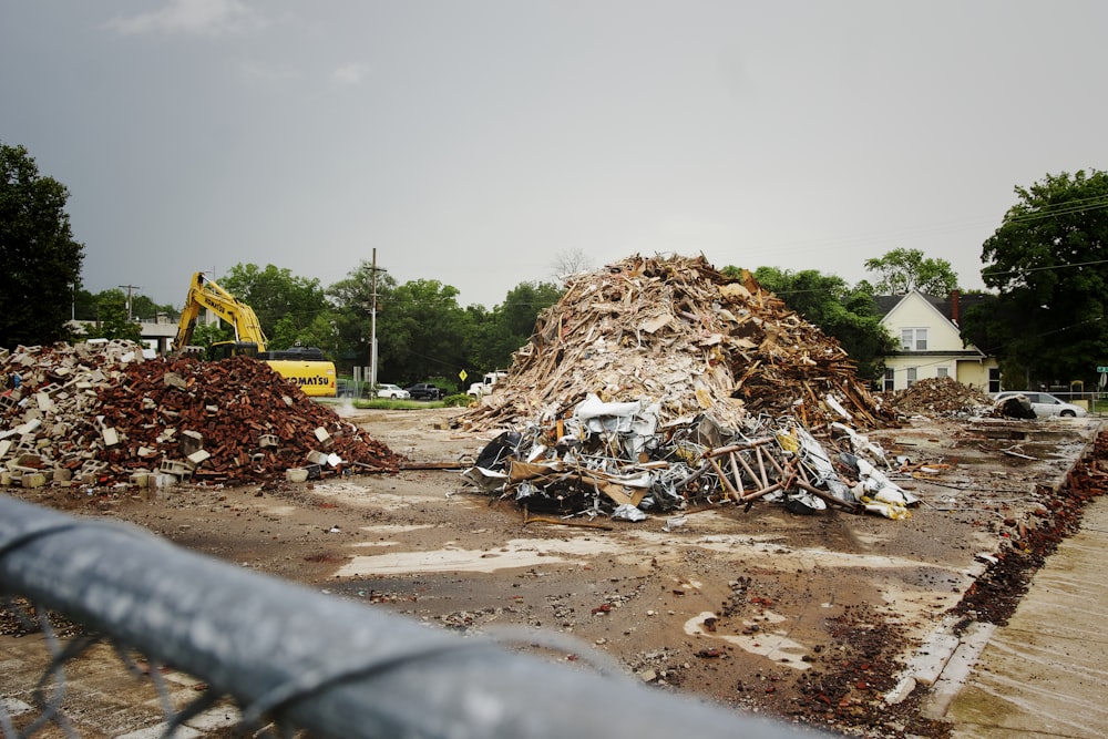 a pile of debris on the side of a road
