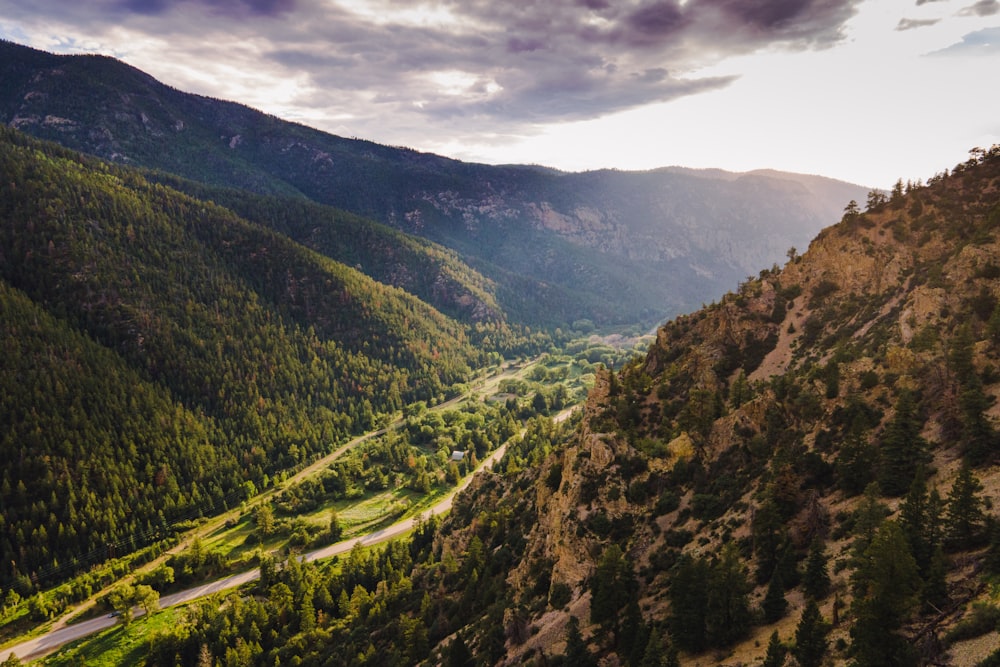 a winding road through a valley