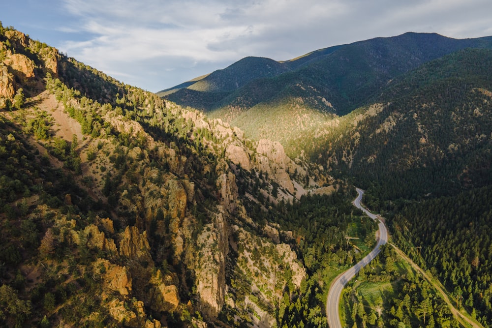 a winding road through a valley