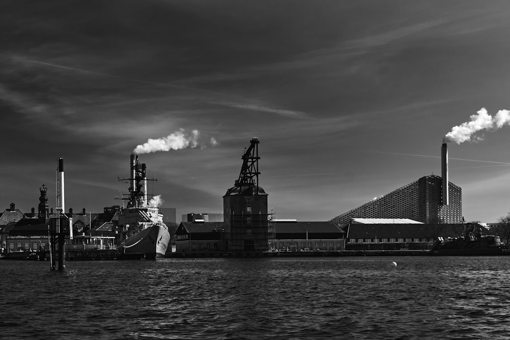 a body of water with a building in the background