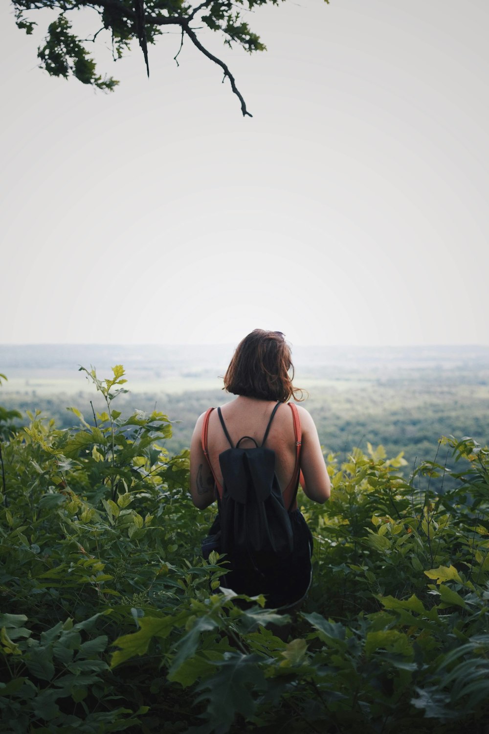 a person sitting in a field