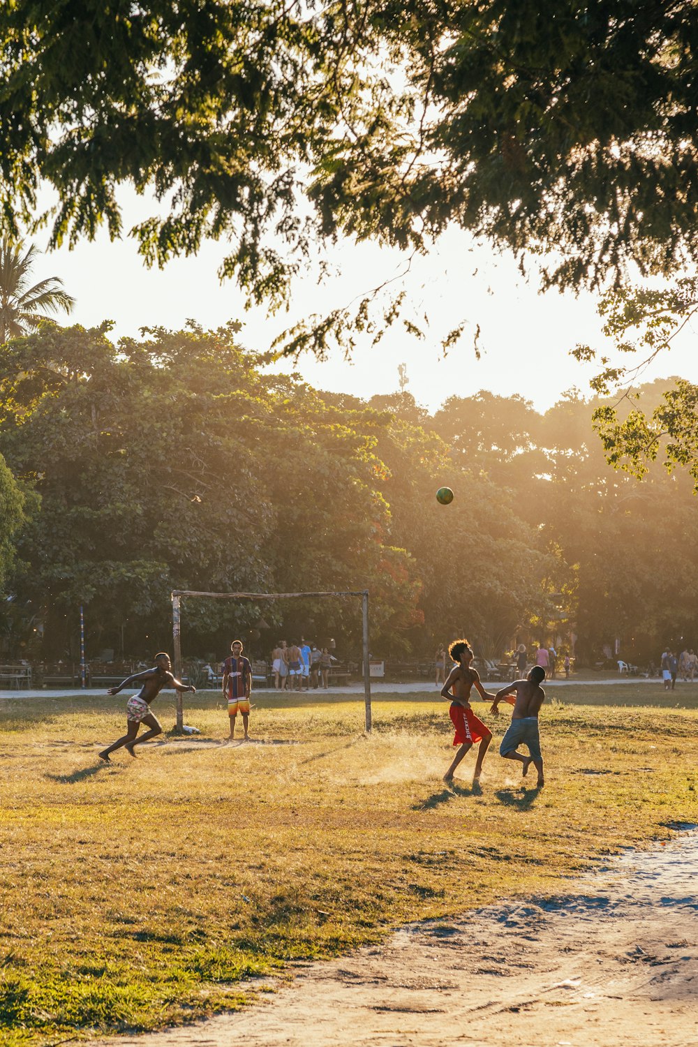 a group of people playing football