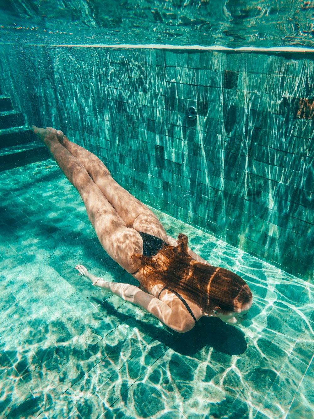 a person swimming in water