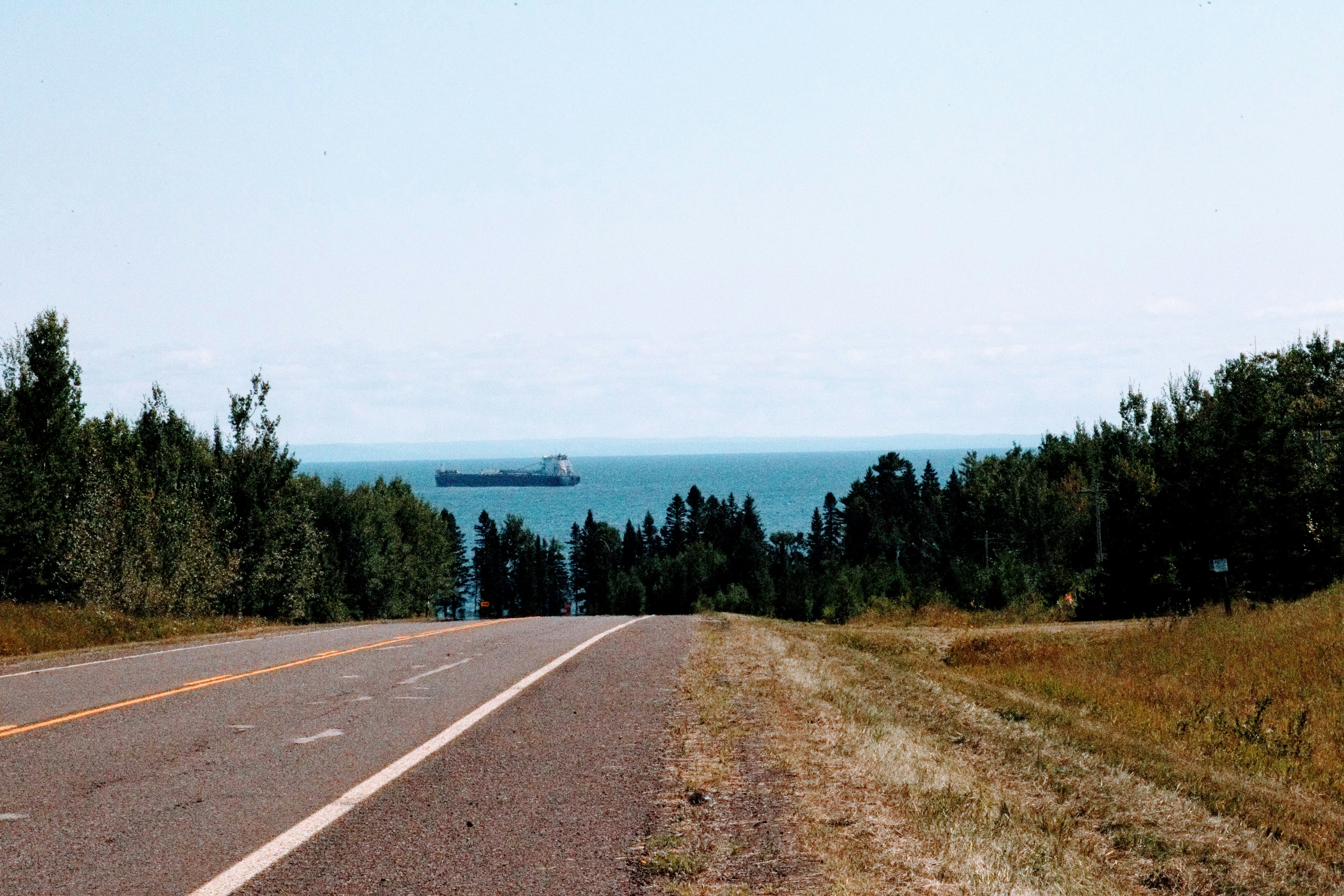 a road with trees on the side