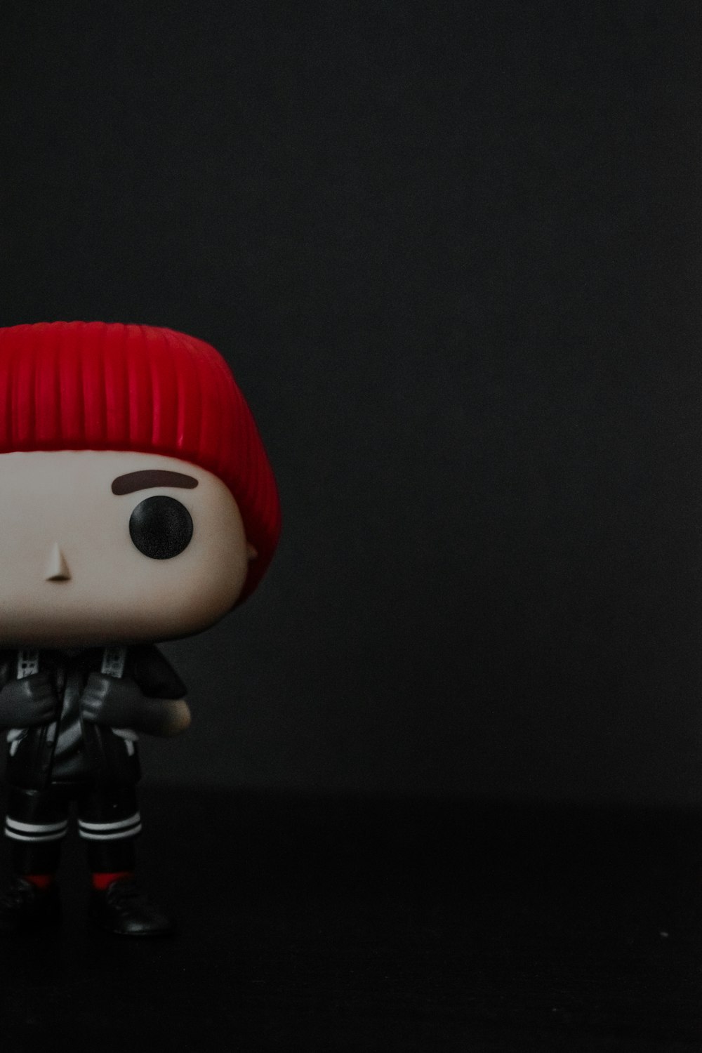 a toy doll with a red hat