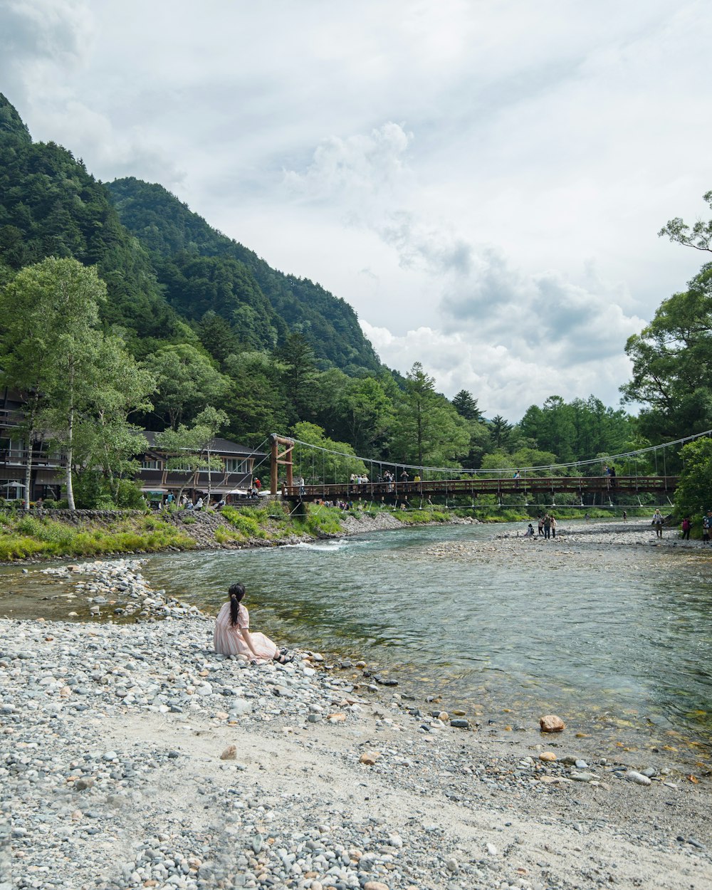 a person sitting in a river