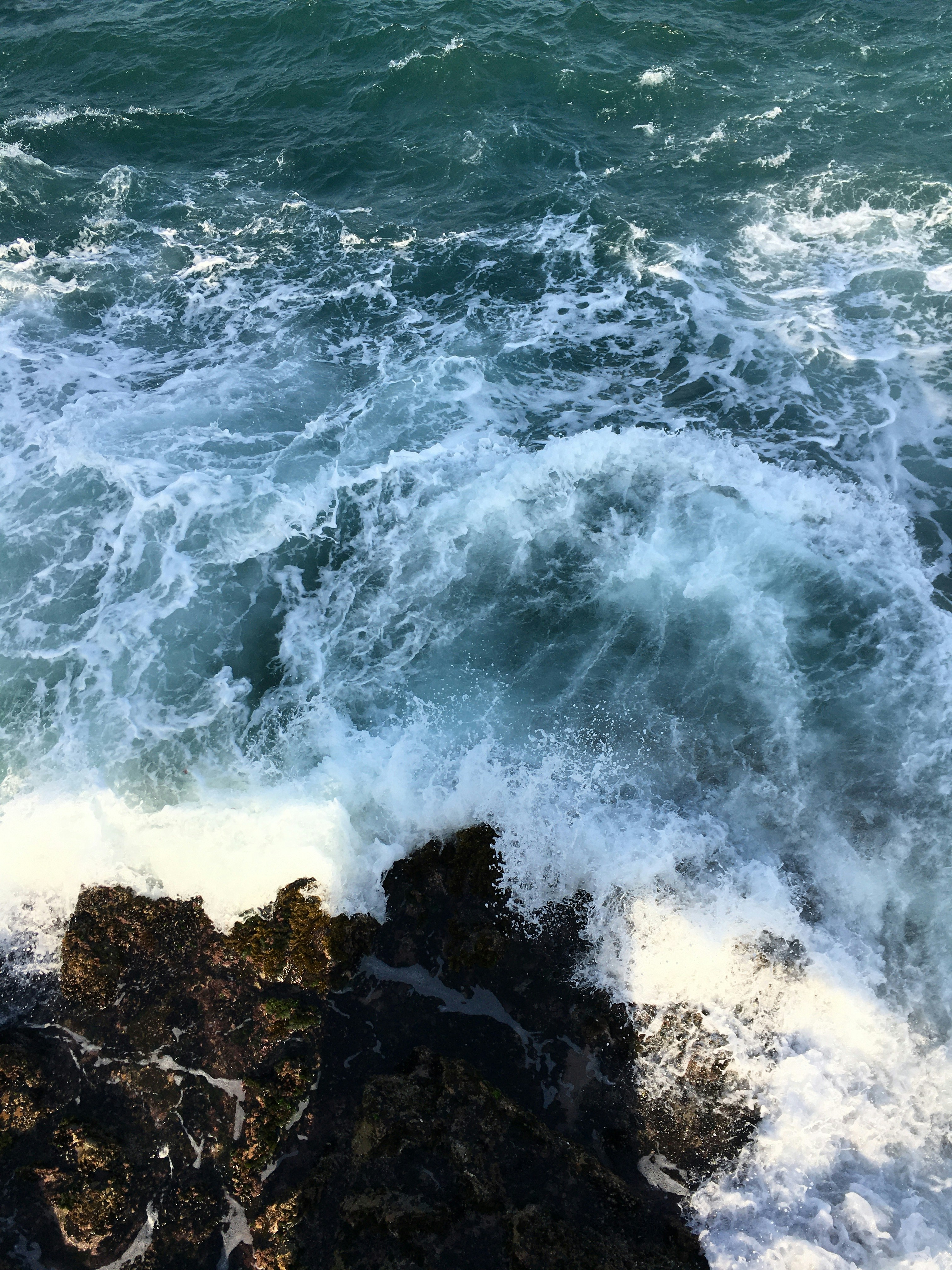 waves crashing on rocks