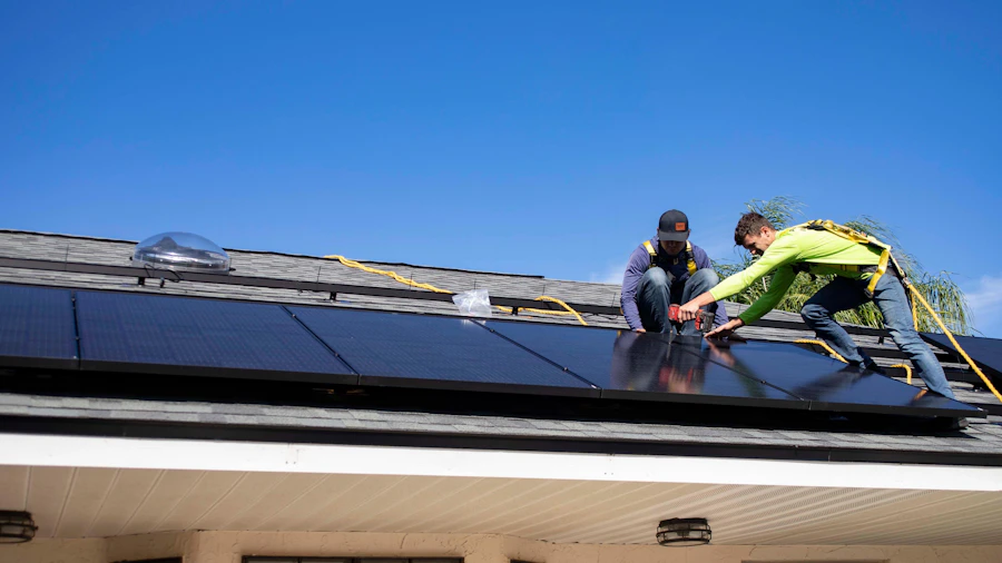 Crew installing shingles on a sunny day