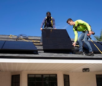 men on top of a roof