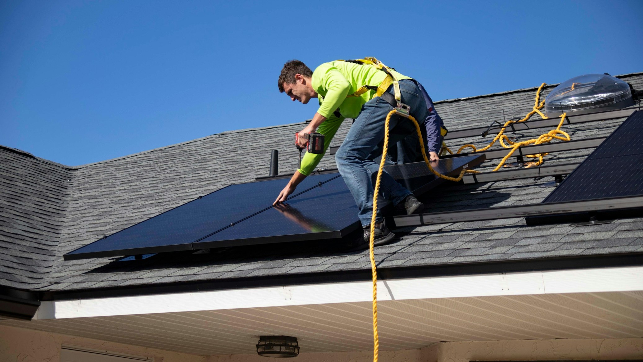 Man installing solar panels