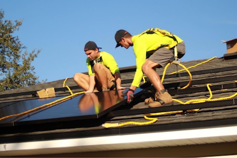 men working on a roof