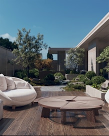 a patio with a table and chairs