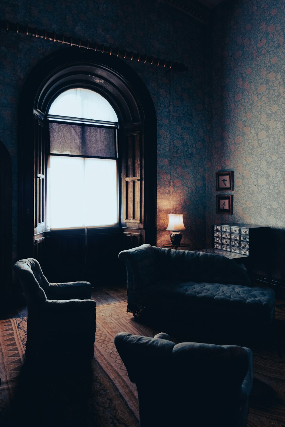 a room with a couch and a window