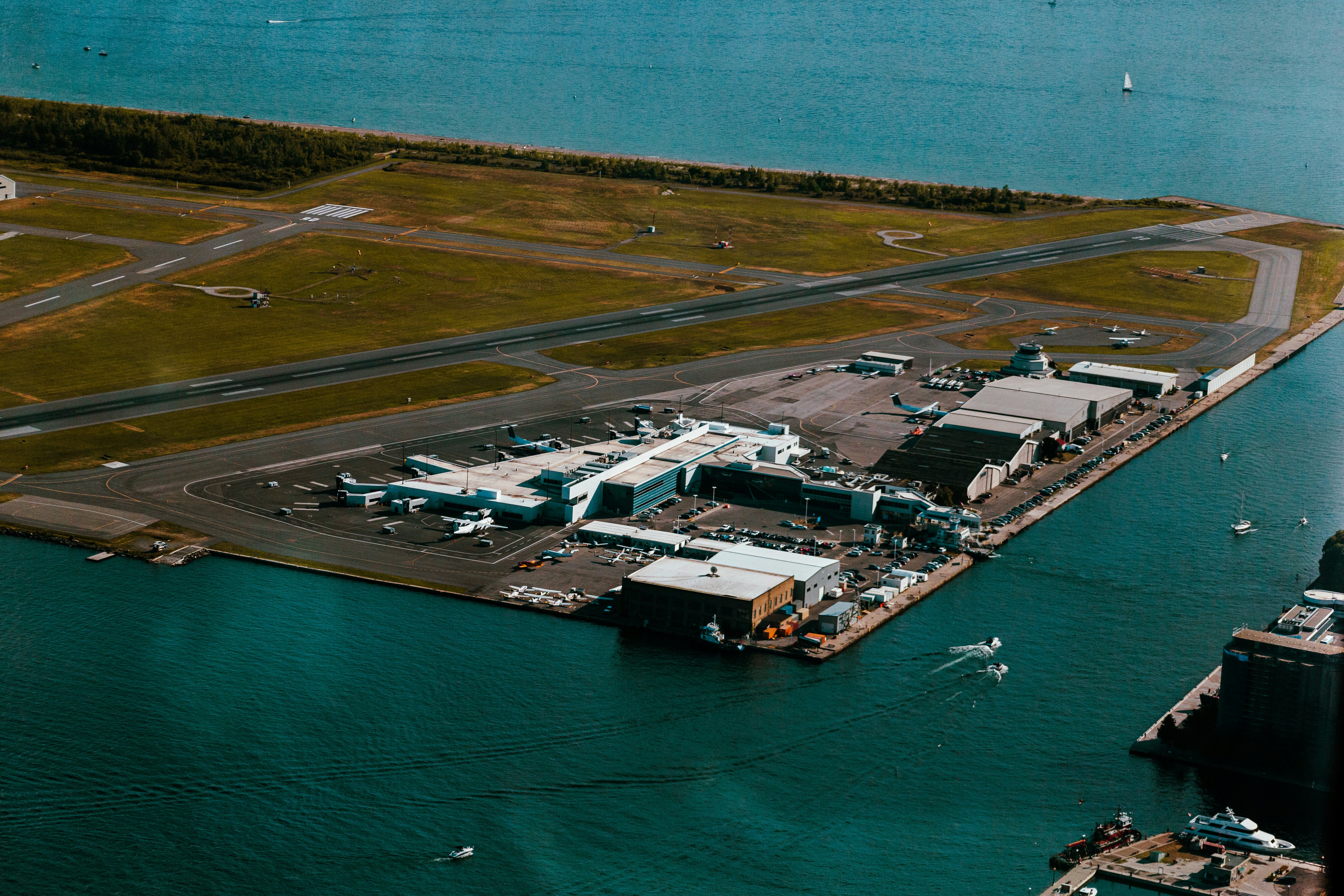 a body of water with buildings and boats in it
