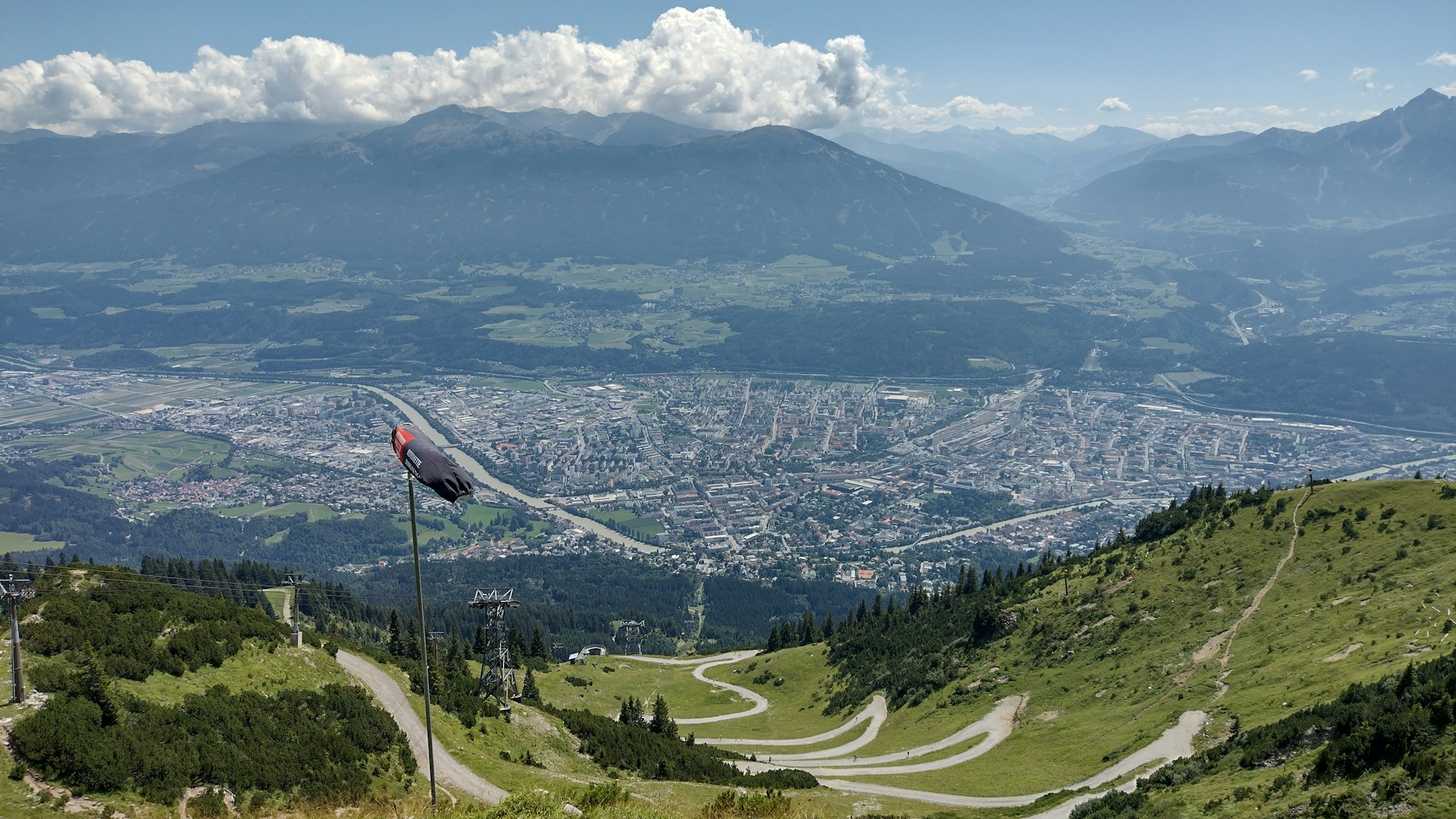 woman wearing yellow long-sleeved dress under white clouds and blue sky during daytime