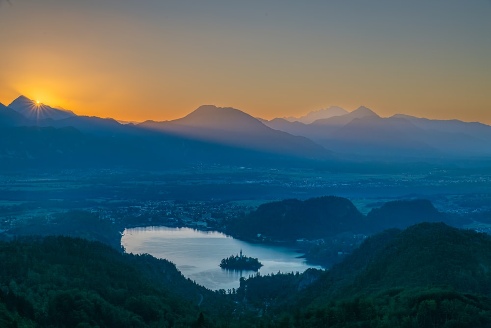 a lake surrounded by mountains