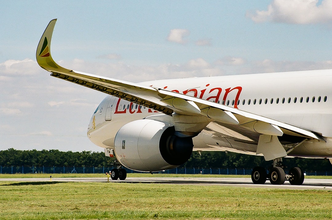 a large airplane on the runway,