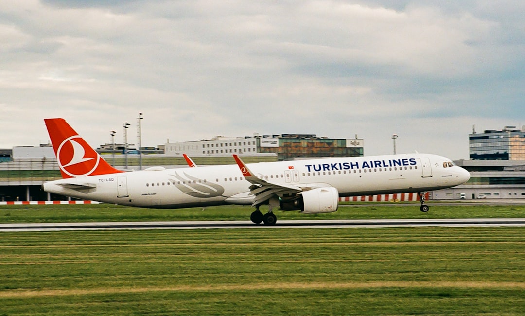 a large airplane on the runway,