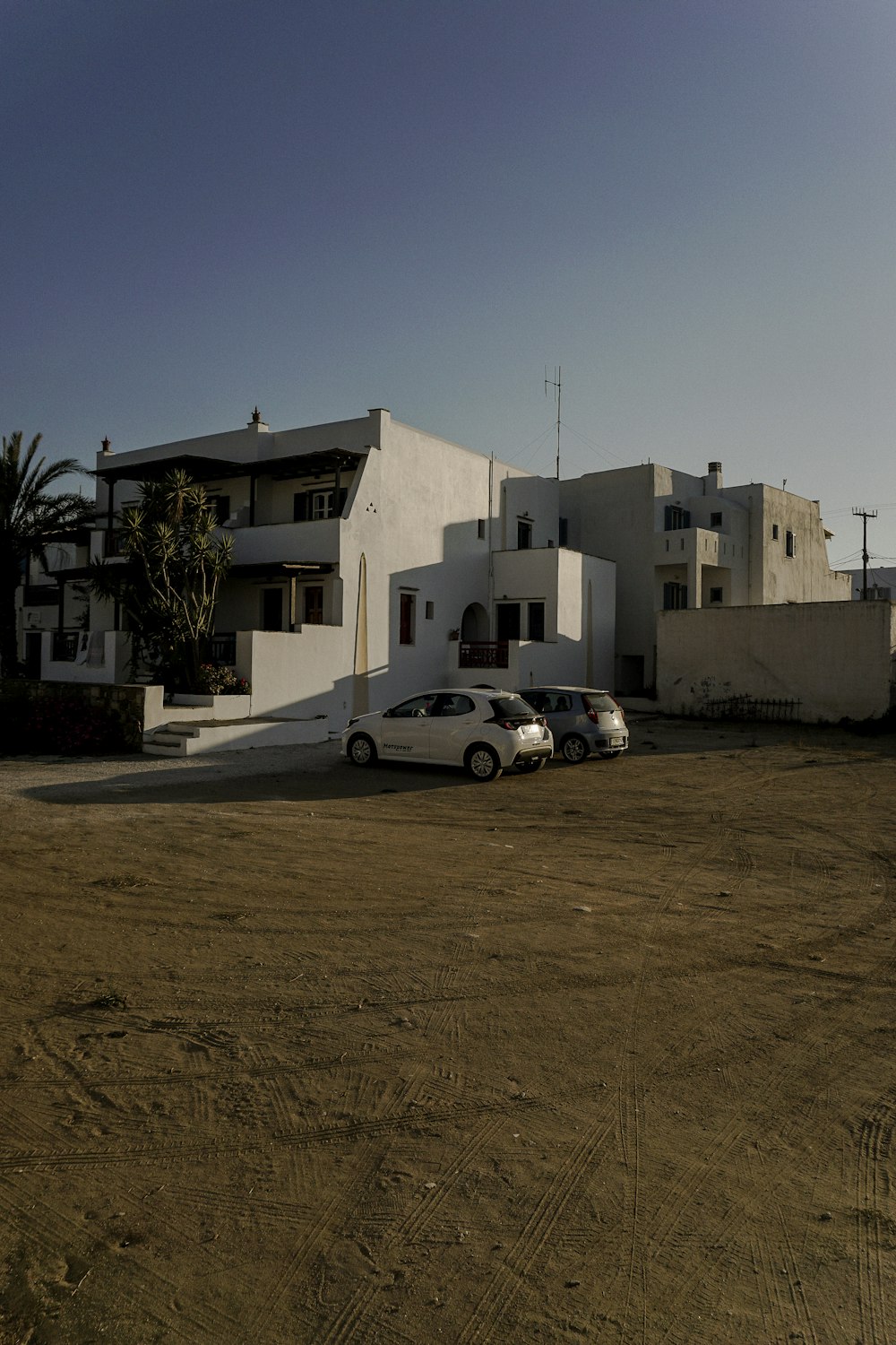 a building with cars parked in front