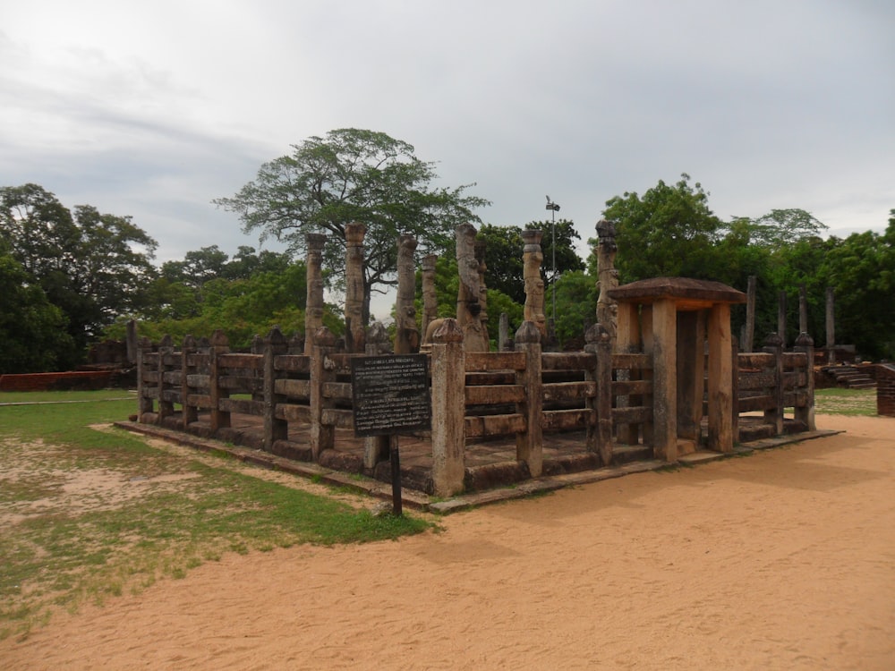 a wooden fence with a sign on it