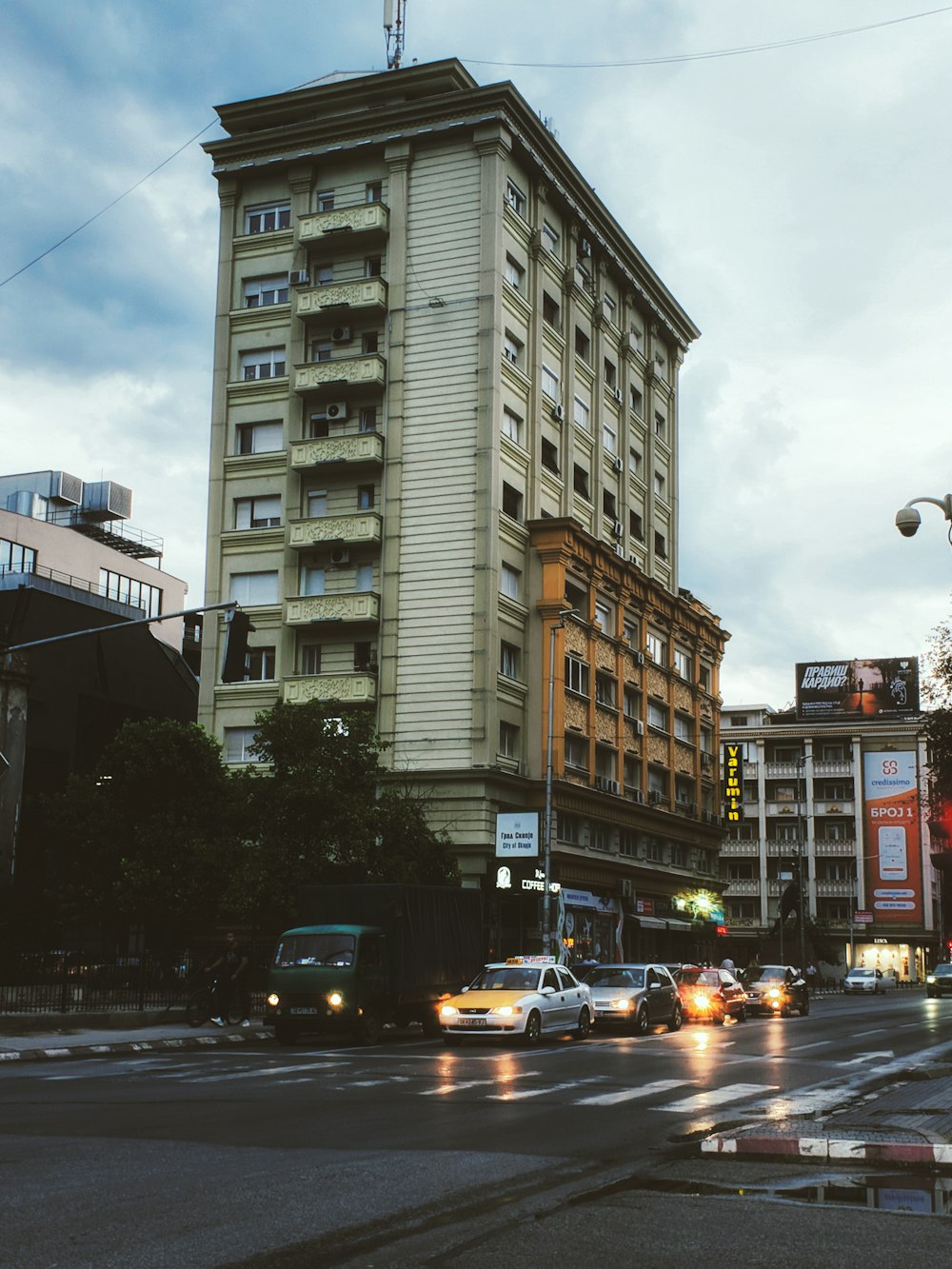 a street with cars and buildings on either side of it