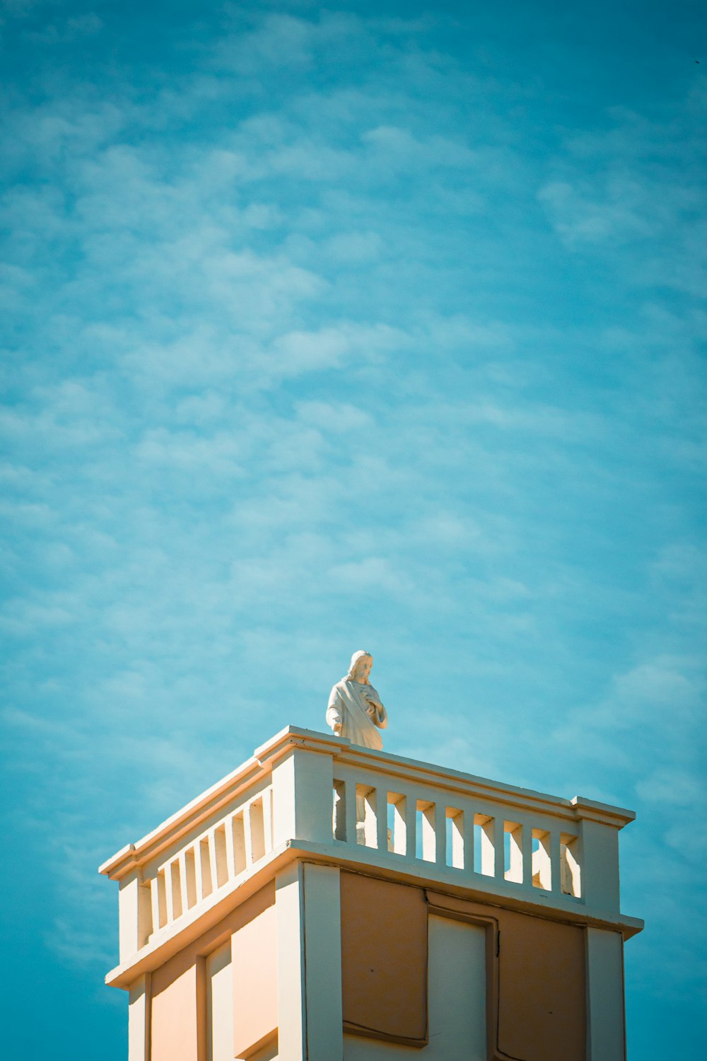 a statue on top of a building