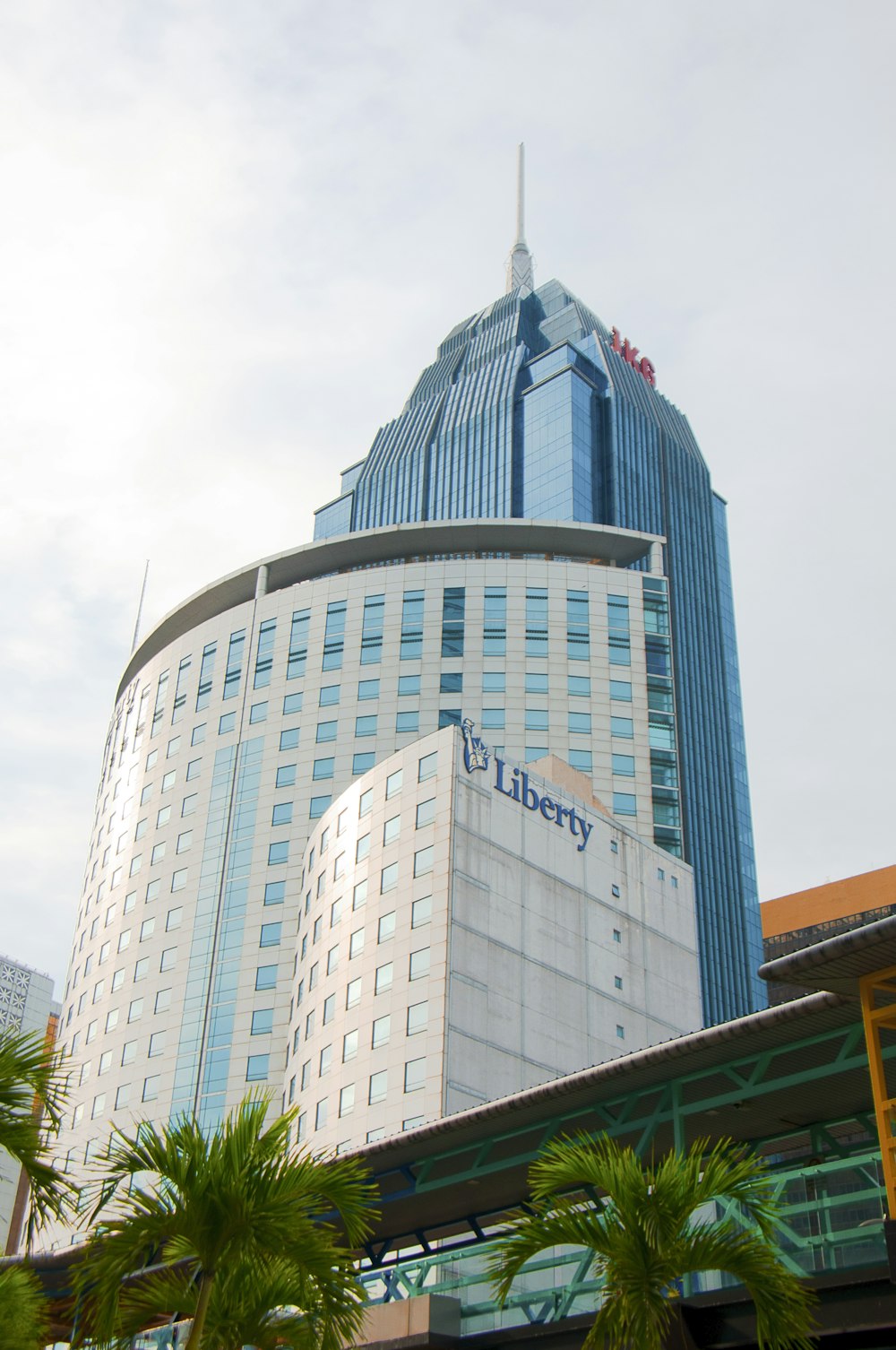 a tall building with a flag on top