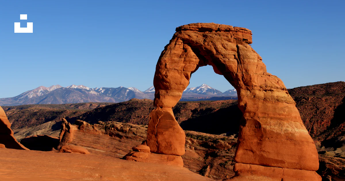 An Arch That Rocks A large rock arch in the desert photo – Free Delicate arch Image on ...