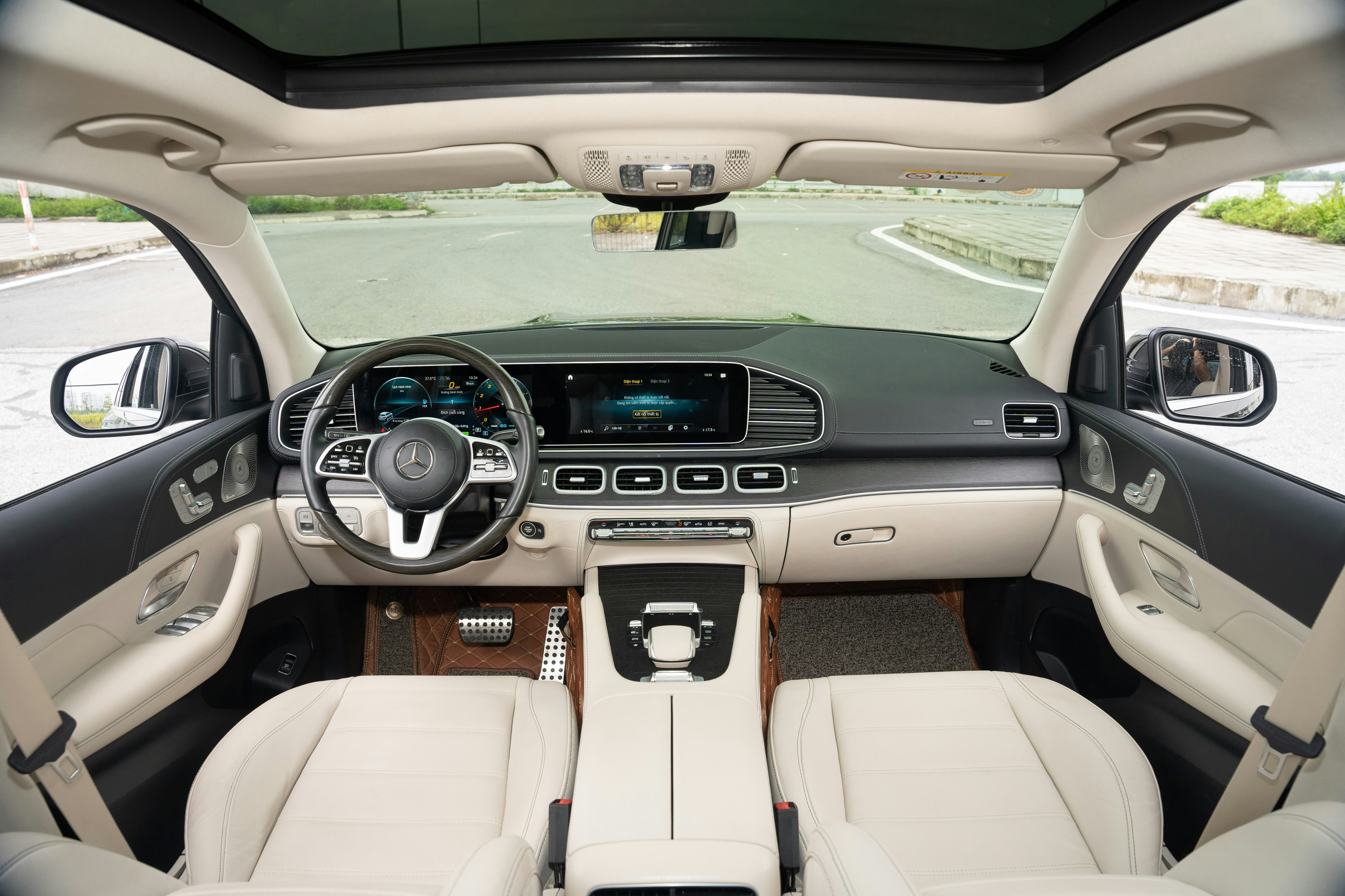 Mercedes EQB electric SUV interior with two digital screens and modern front seats