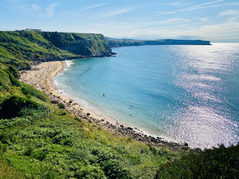 a beach with a body of water