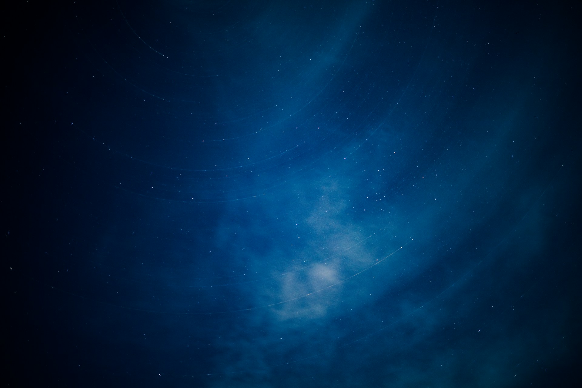 a blue sky with stars