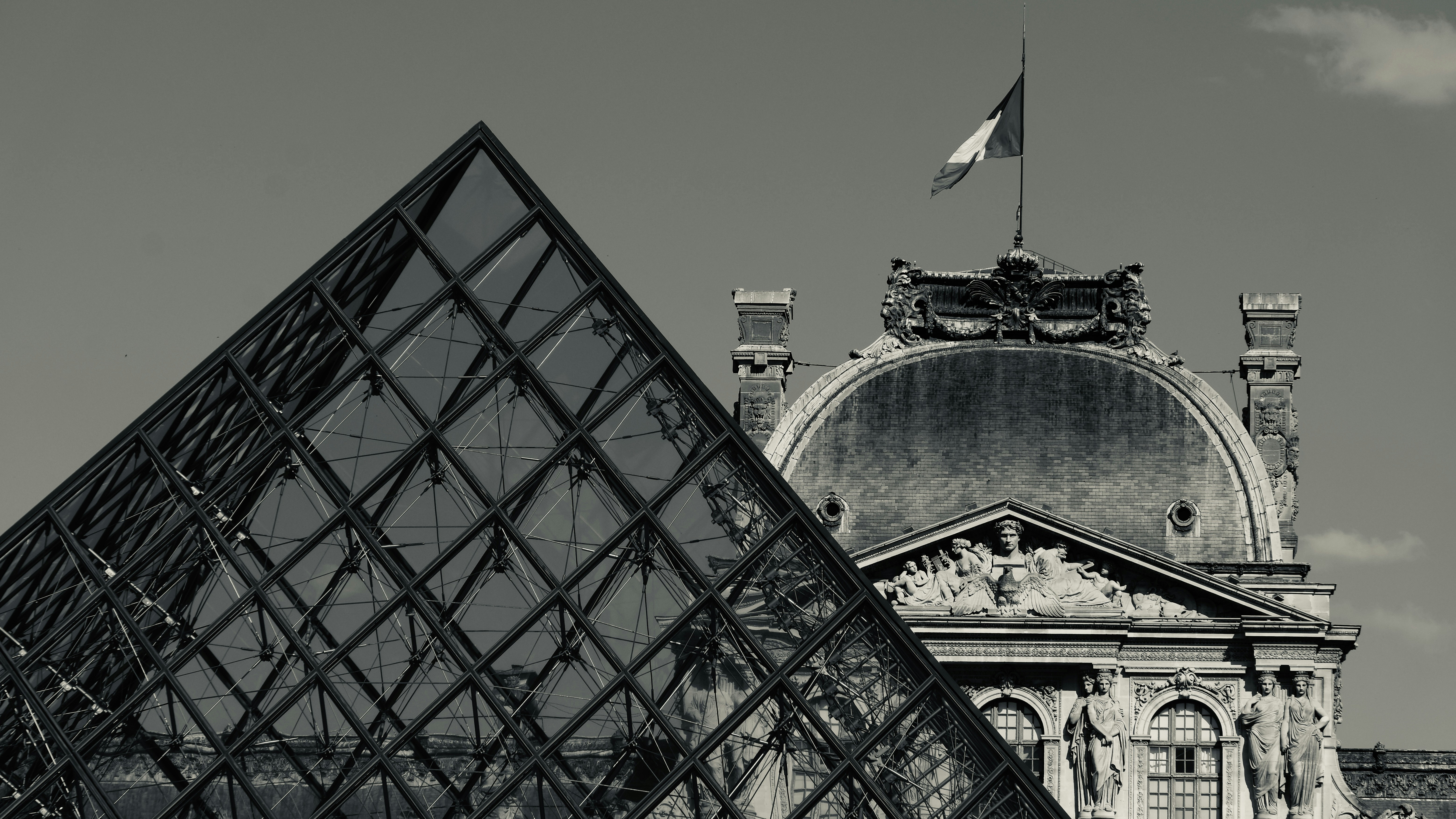 a large building with a flag on top