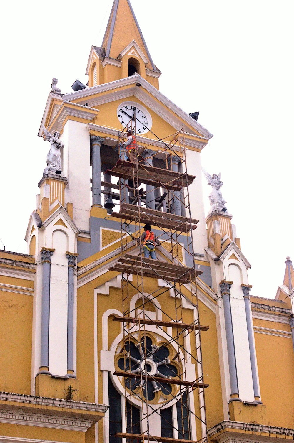 a clock tower with a bell