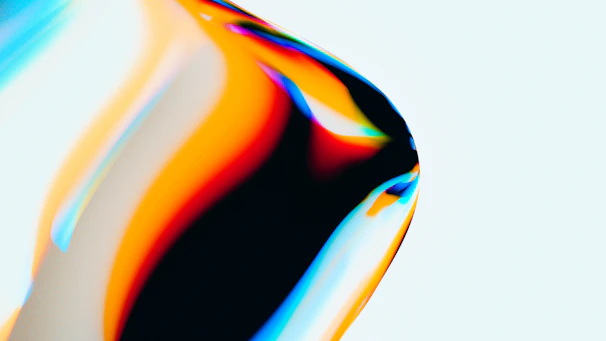 An abstract motion design with flowing shapes and vibrant colors that respond to user scrolling.