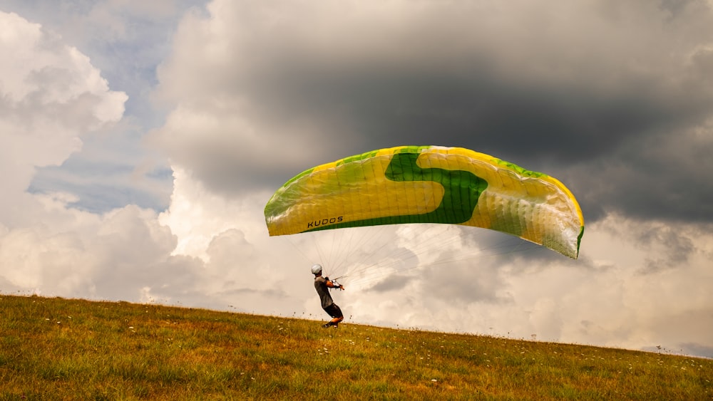 a person holding a parachute