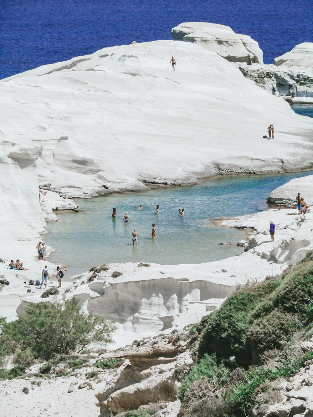 a group of people on a beach