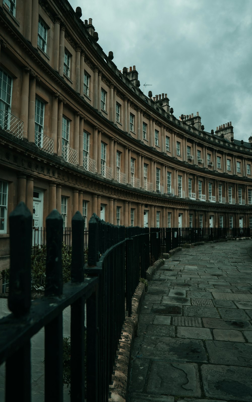 a building with a fence in front