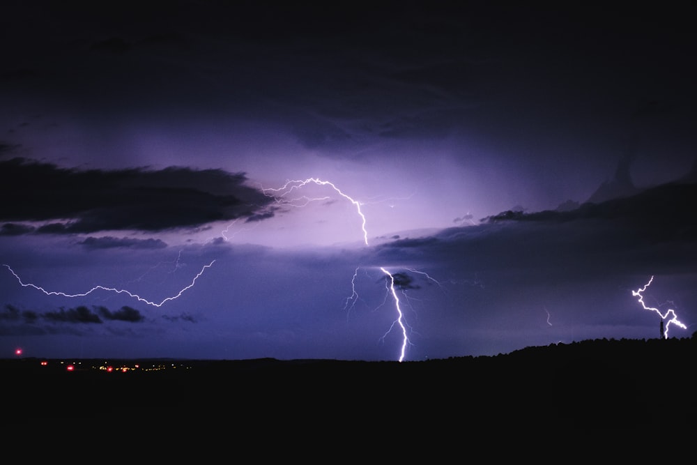 lightning striking a city at night