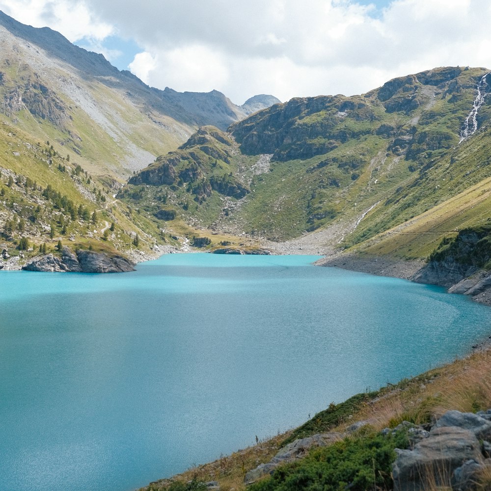 a lake surrounded by mountains