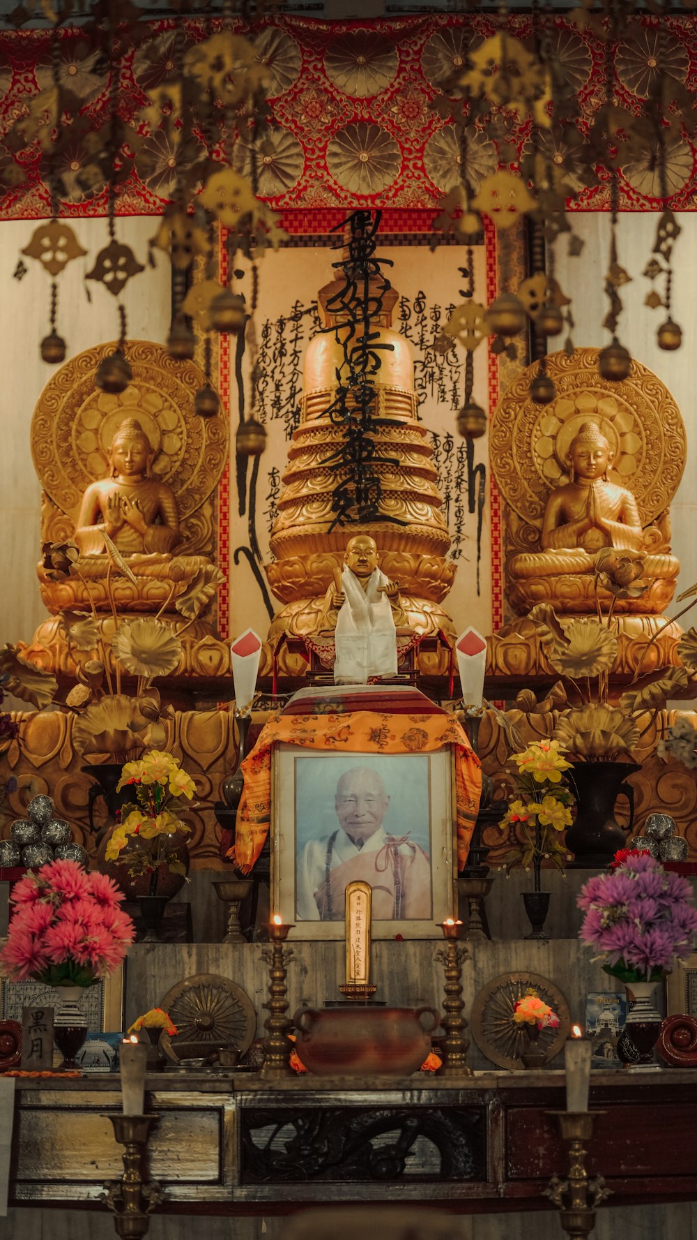 a shrine with a large statue