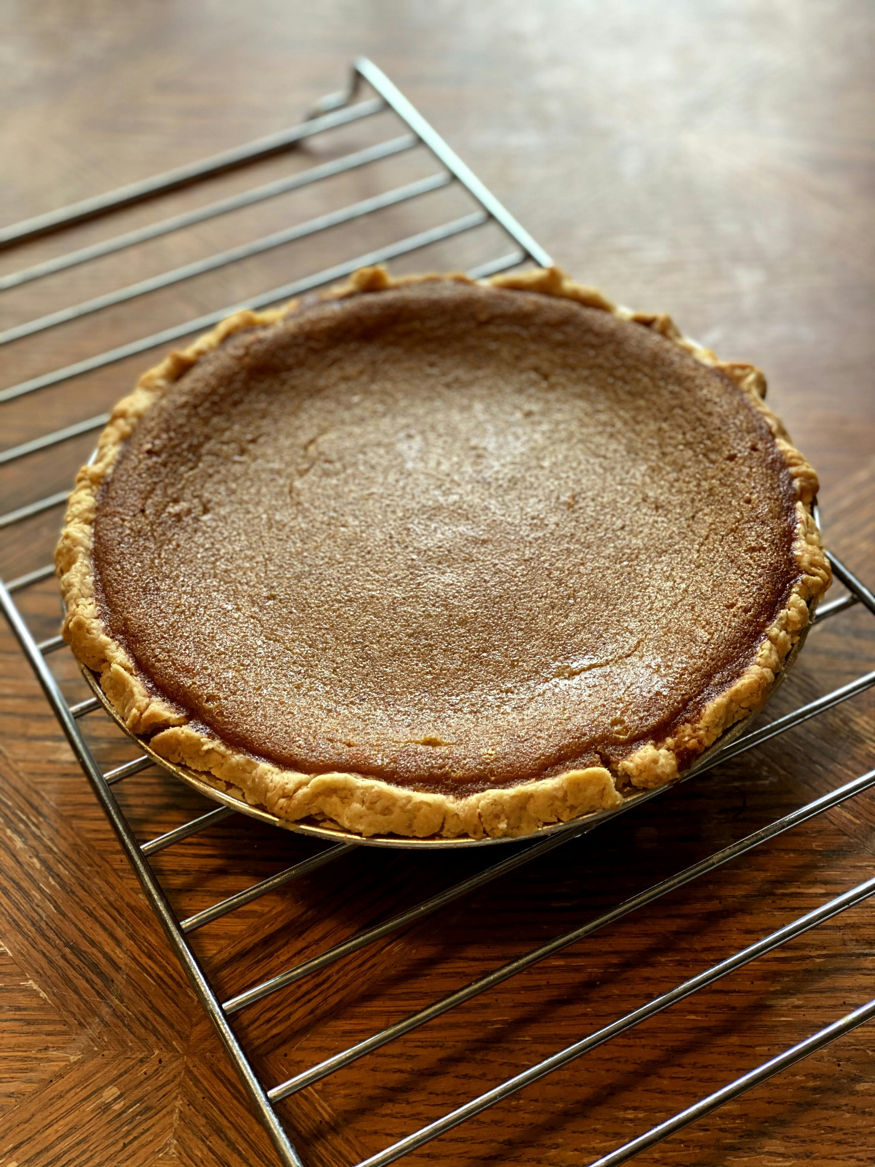 a loaf of bread on a cooling rack