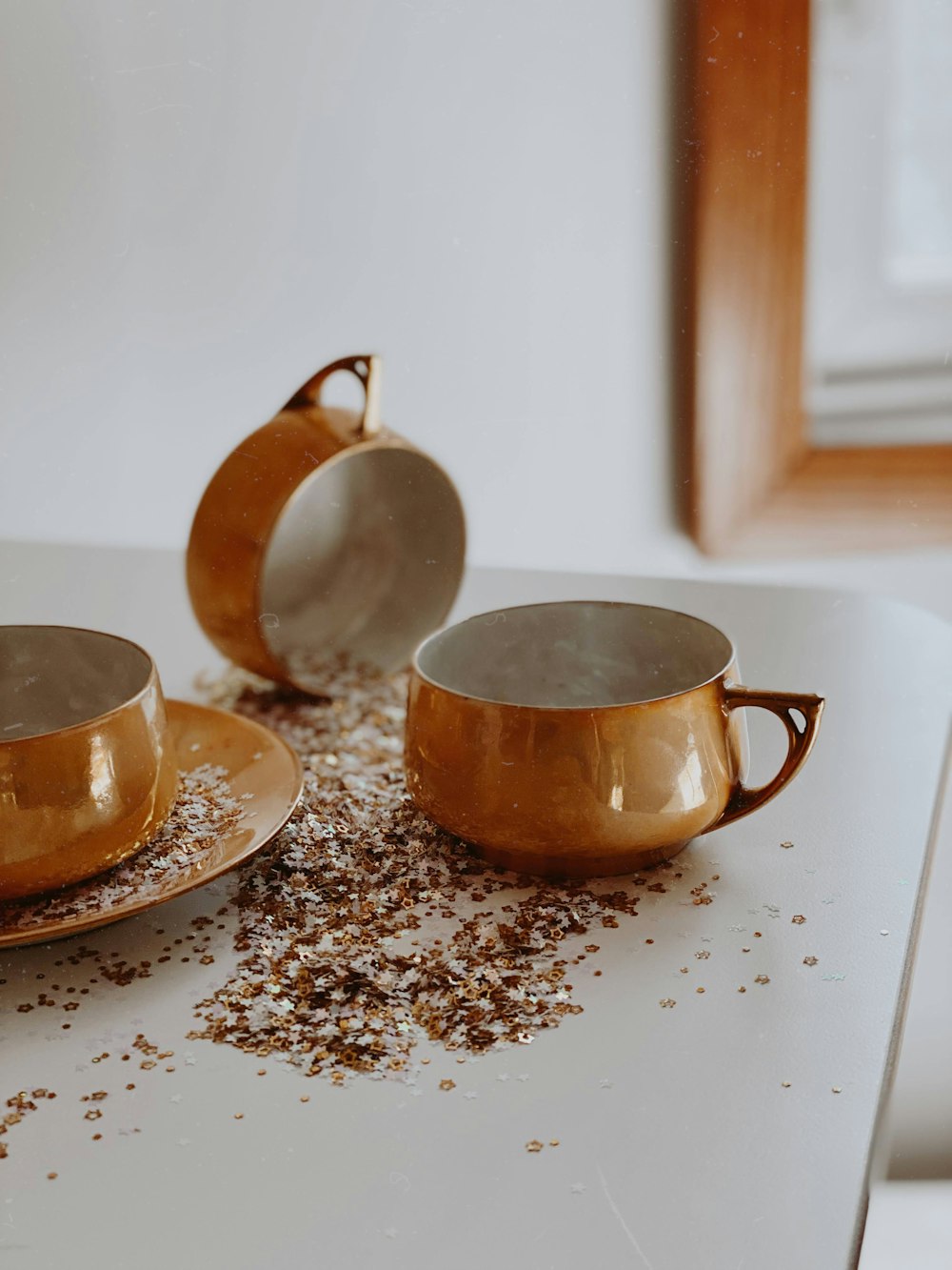 a teapot and cups on a table