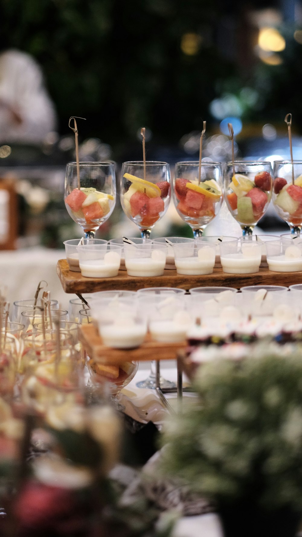 a group of glasses with liquid in them