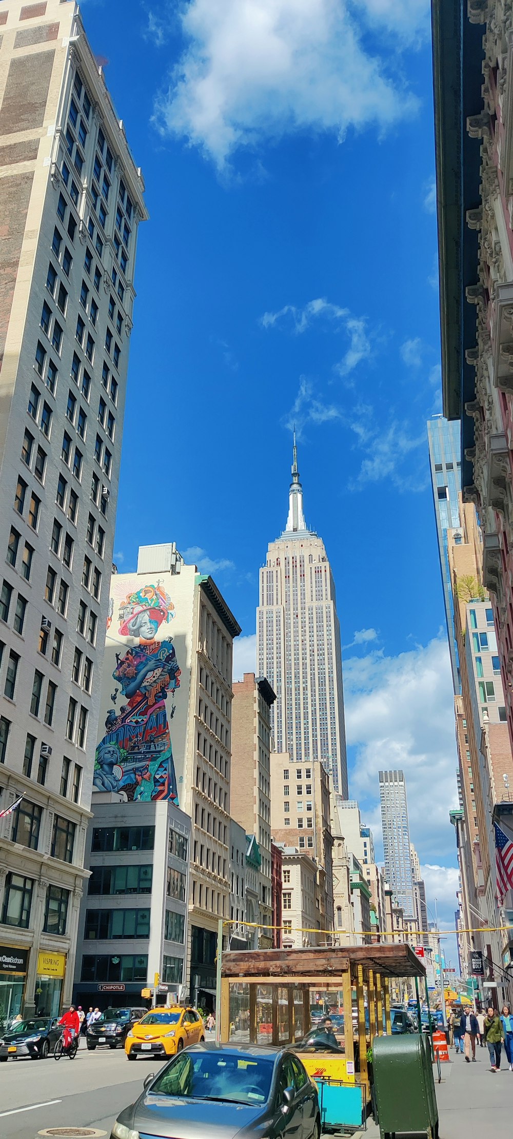 a city street with tall buildings