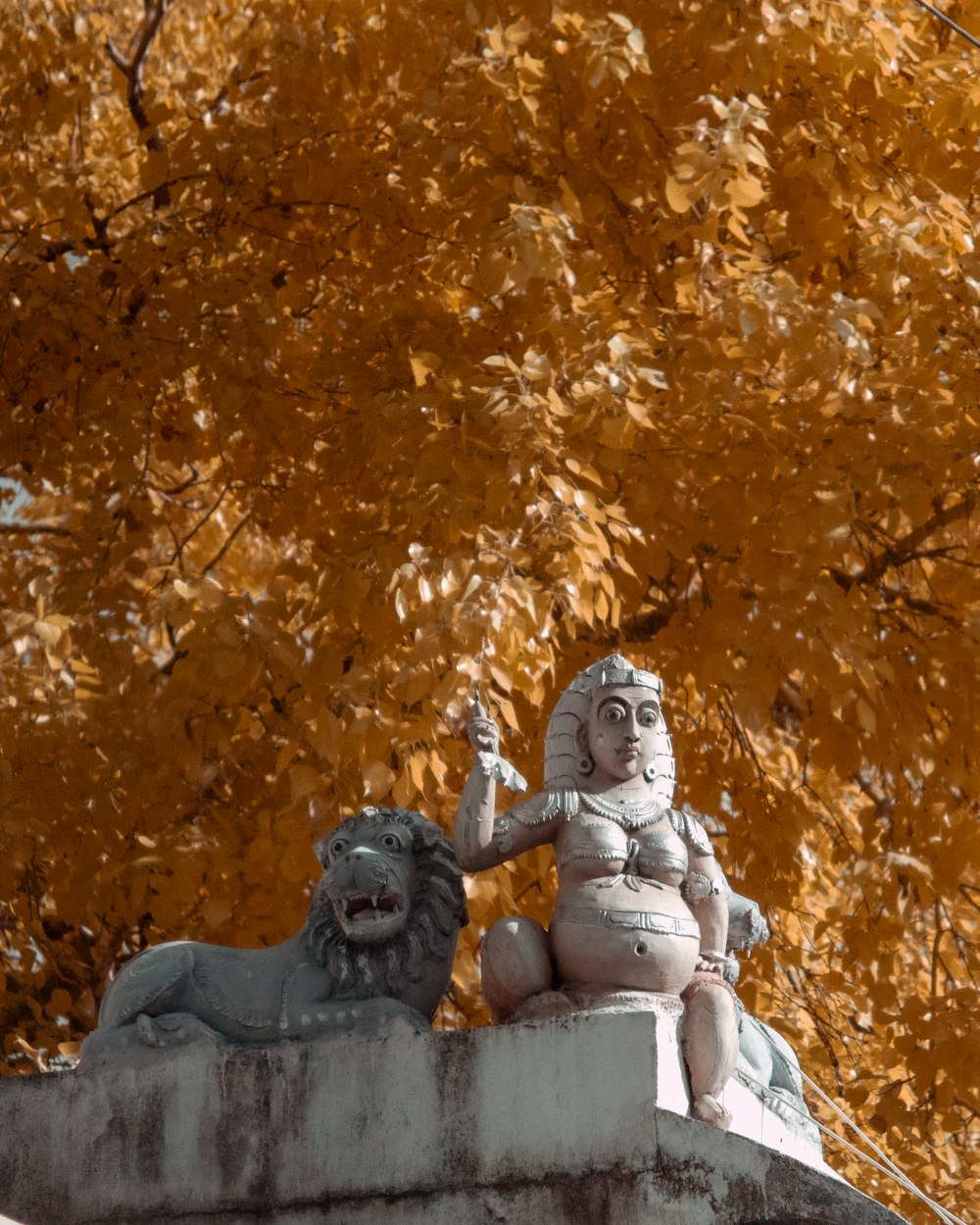 a statue of a person and a dog