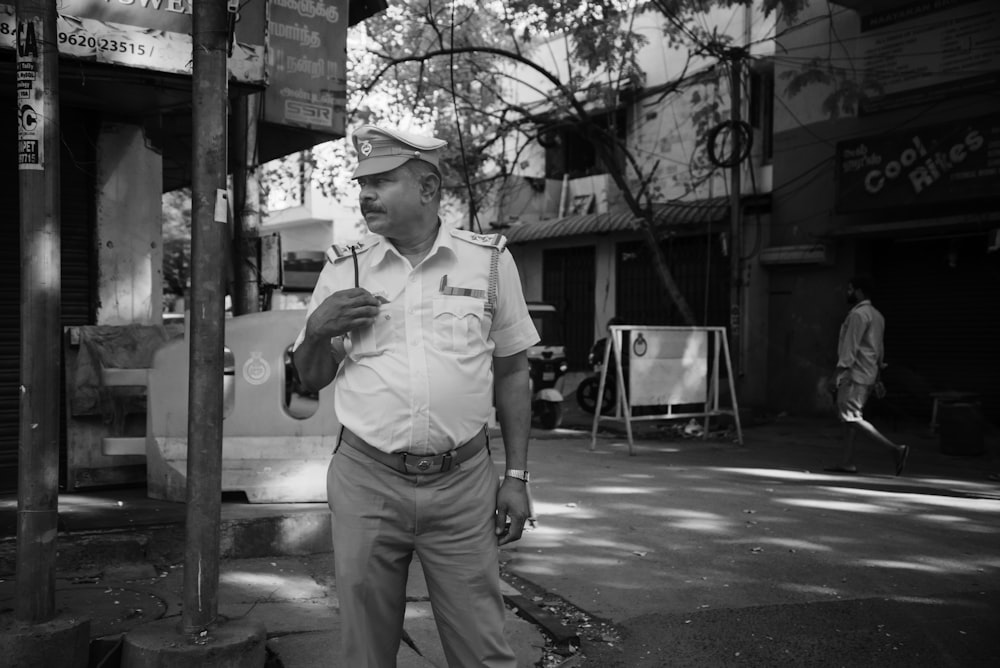 a person standing on a street corner