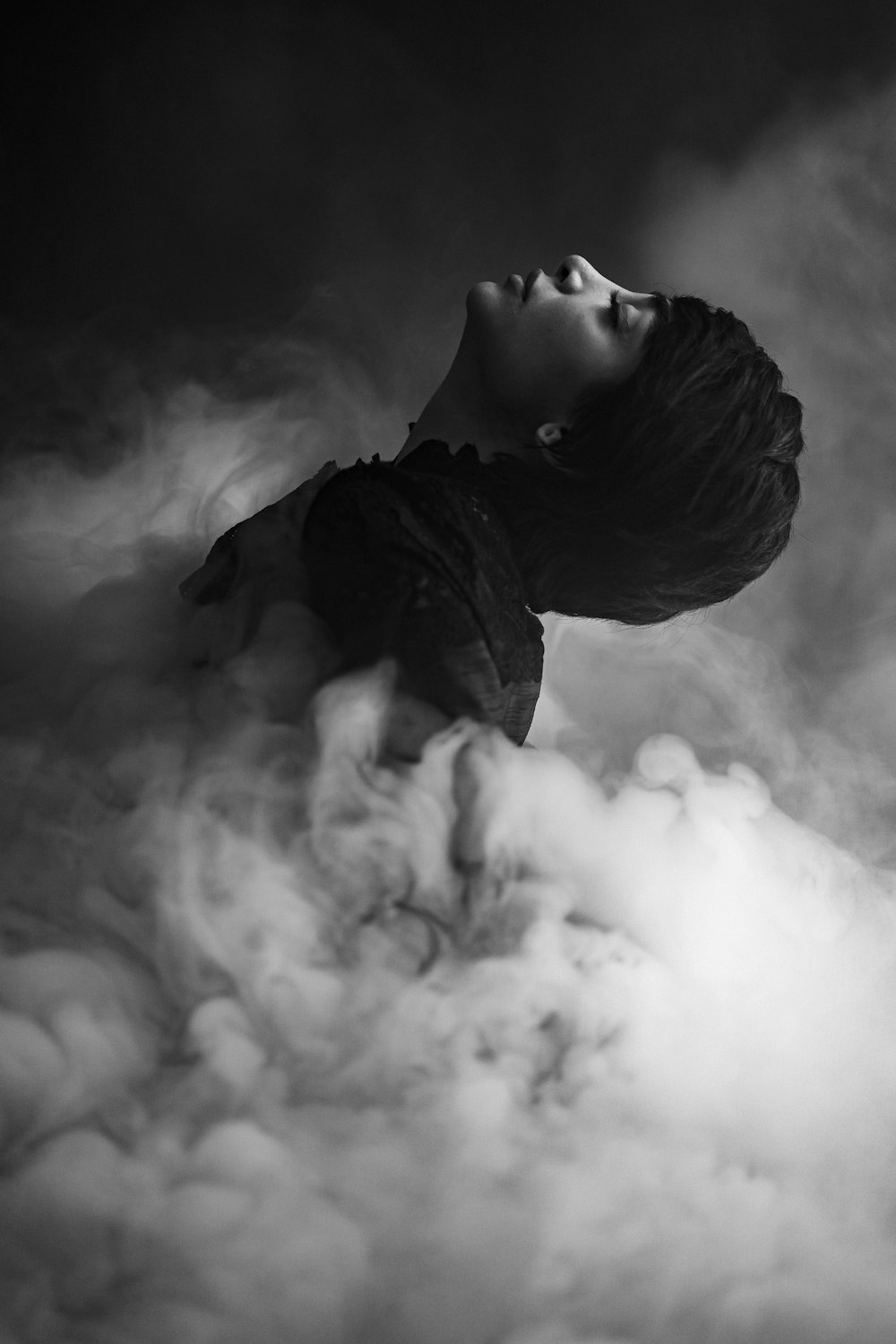 a person lying in the clouds