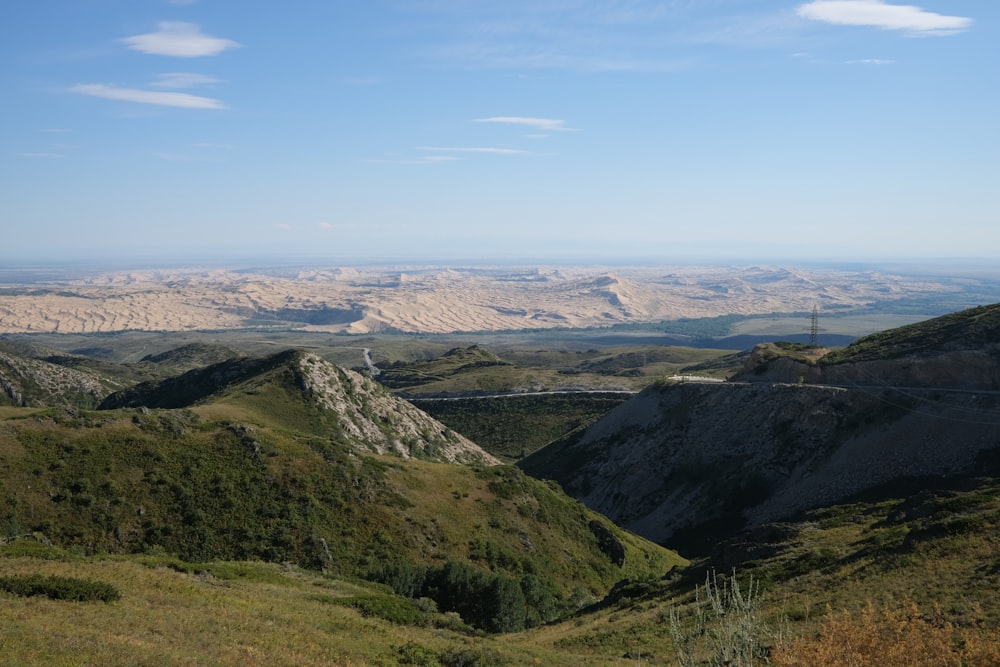 a landscape with hills and trees